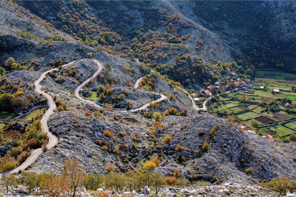 Forest road and limestone mountain landscape on Orjen above Herceg Novi