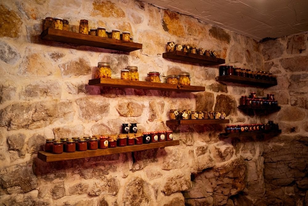 Guests sharing a private traditional dinner in the countryside above Herceg Novi